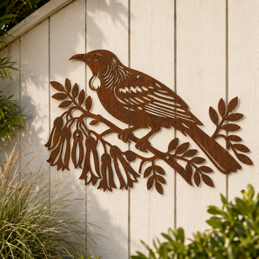 Corten steel Tui Bird wall art displayed outdoors