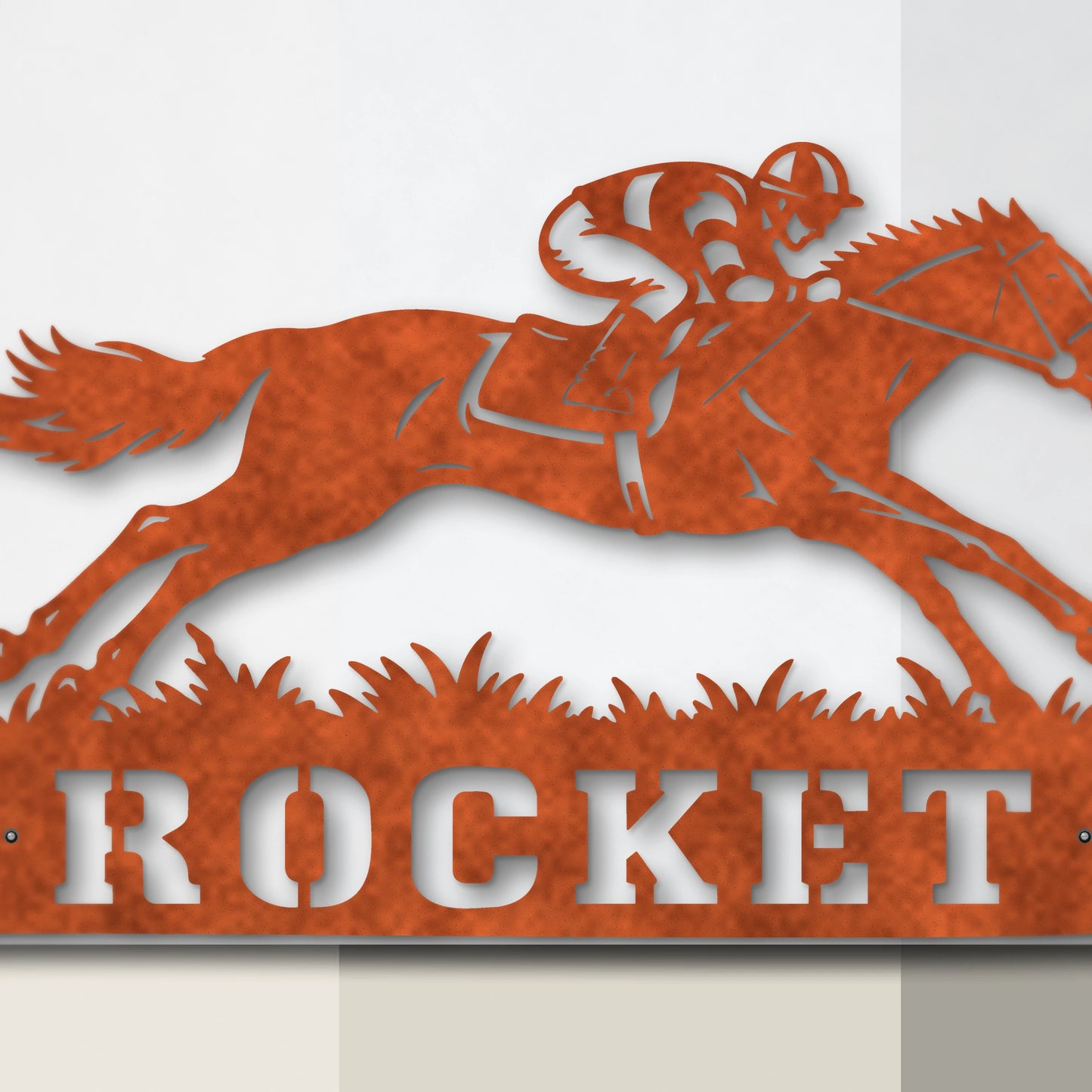 Close-up of Racing Horse laser-cut Corten steel detail and mounting