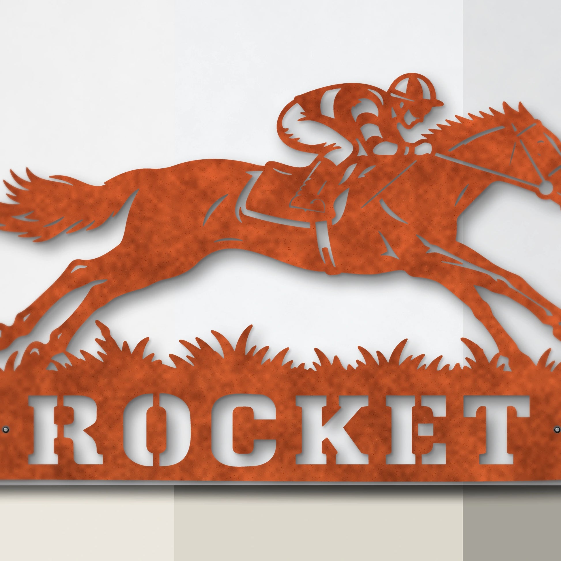 Close-up of Racing Horse laser-cut Corten steel detail and mounting