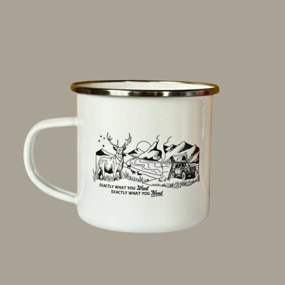 White mug with black graphic and text on a beige background